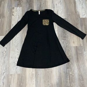 Black xhilaration dress with gold sequin pocket